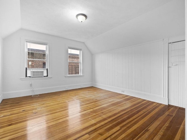 9-11 Edmunds St, Cambridge, MA 02140 - bonus room featuring vaulted ceiling, wood finished floors, cooling unit, and baseboards