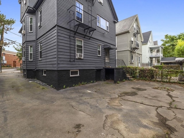 9-11 Edmunds St, Cambridge, MA 02140 - view of side of home featuring central AC unit