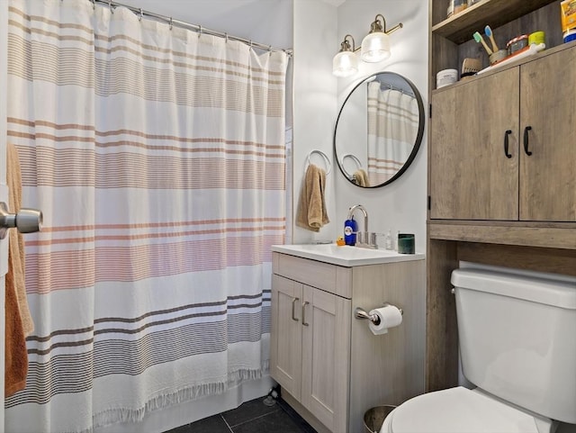 9-11 Edmunds St, Cambridge, MA 02140 - bathroom featuring vanity, toilet, tile patterned floors, and a shower with curtain