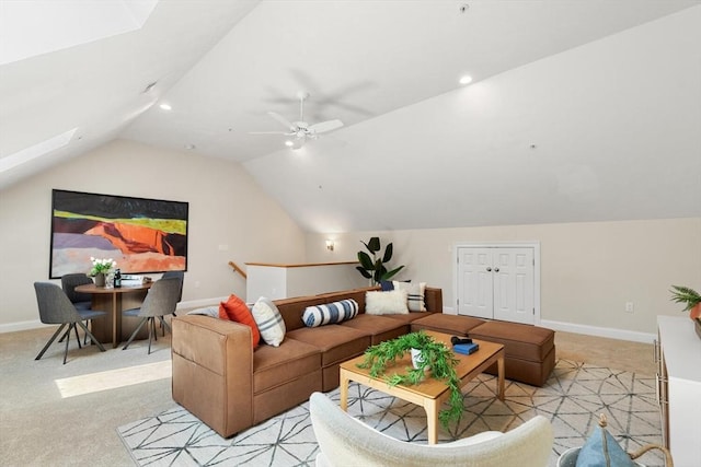 living area featuring vaulted ceiling, baseboards, light carpet, ceiling fan, and recessed lighting