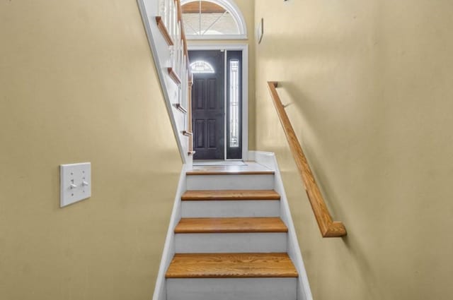 staircase with baseboards