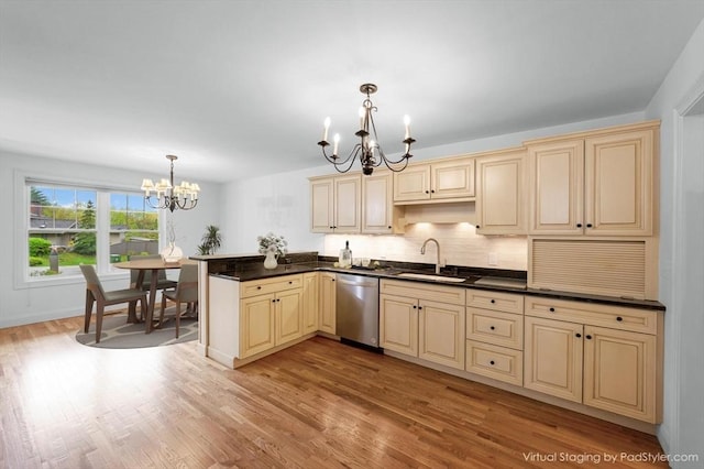 14 Chandler Ln, Amherst, NH 03031 - kitchen with a chandelier, dishwasher, cream cabinets, dark countertops, and light wood finished floors
