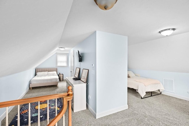 bedroom featuring carpet, vaulted ceiling, and baseboards