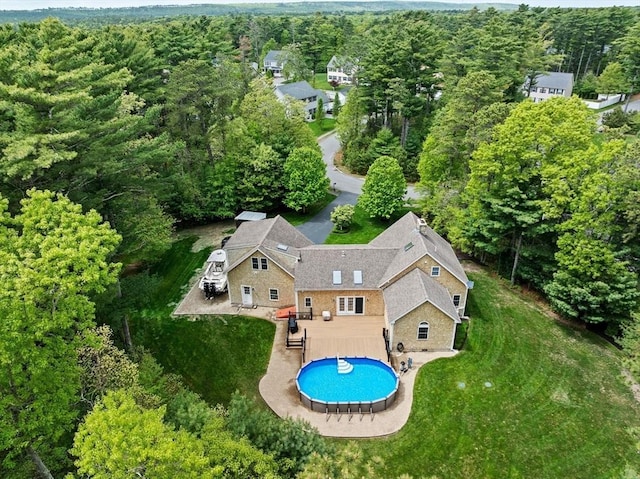 view of subject property featuring a pool area