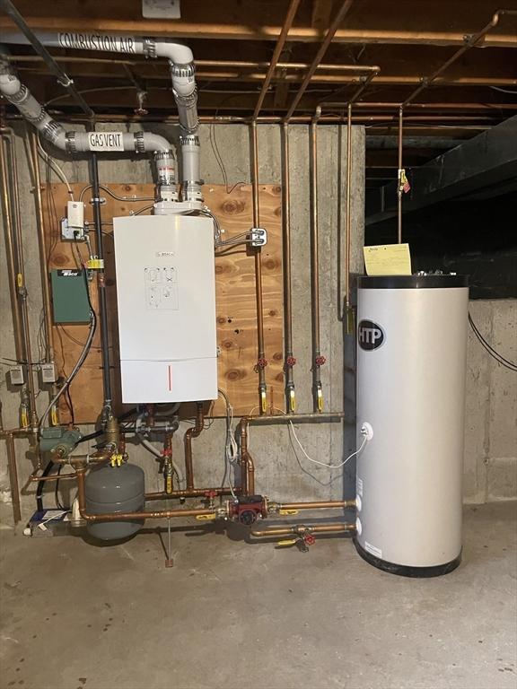 utilities featuring gas water heater and water heater