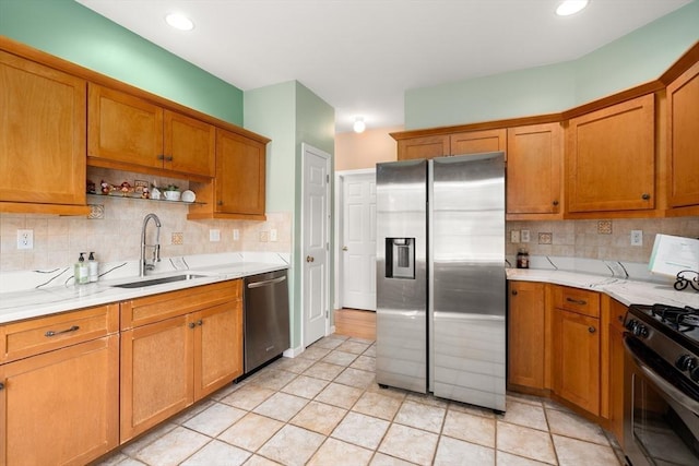 41 Edward Dr Unit 41, Grafton, MA 01536 - kitchen with appliances with stainless steel finishes, decorative backsplash, brown cabinetry, and open shelves