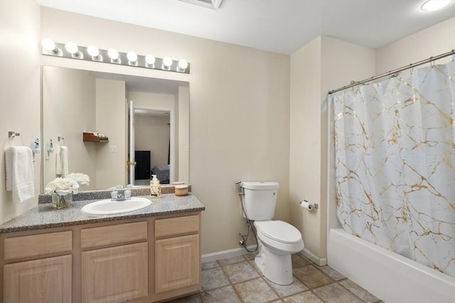 41 Edward Dr Unit 41, Grafton, MA 01536 - ensuite bathroom with vanity, shower / bath combination with curtain, and stone finish floors