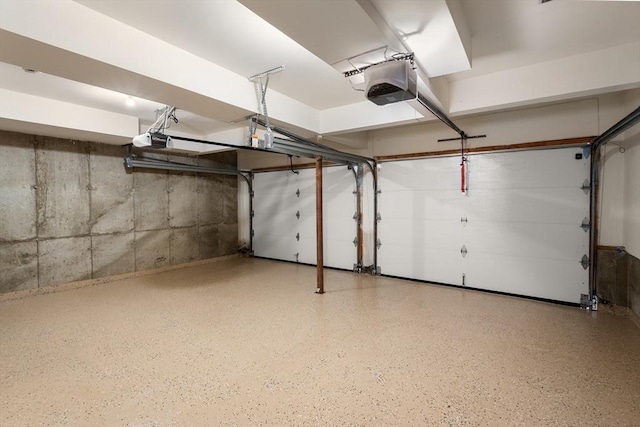 41 Edward Dr Unit 41, Grafton, MA 01536 - garage featuring a garage door opener