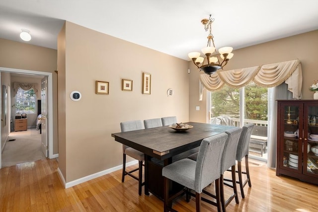 41 Edward Dr Unit 41, Grafton, MA 01536 - dining room with a chandelier and light wood-style flooring