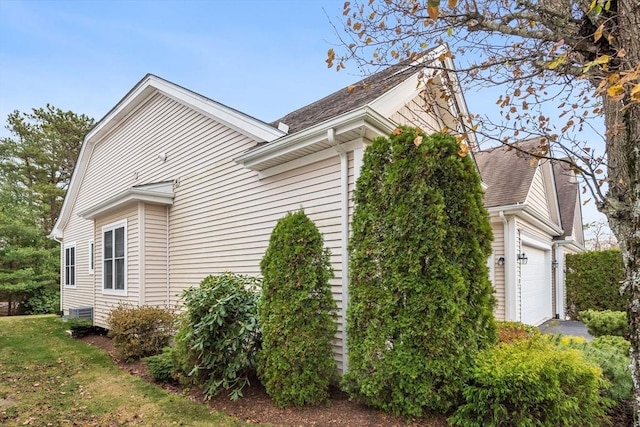 view of home's exterior with a garage