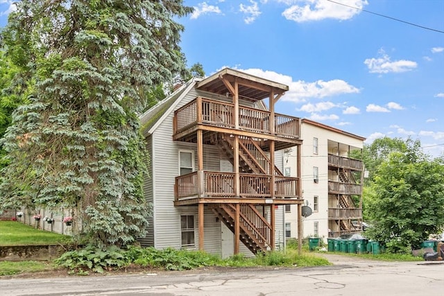 376 Elm St, Fitchburg, MA 01420 - back of property featuring stairway and a deck