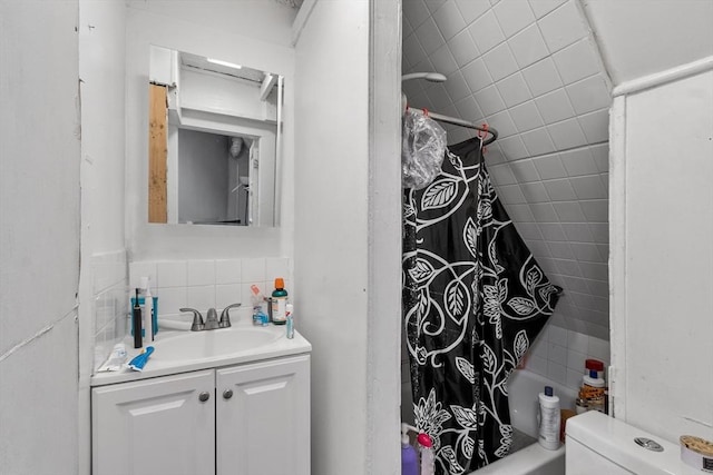 376 Elm St, Fitchburg, MA 01420 - bathroom with vanity, decorative backsplash, and shower / bath combo