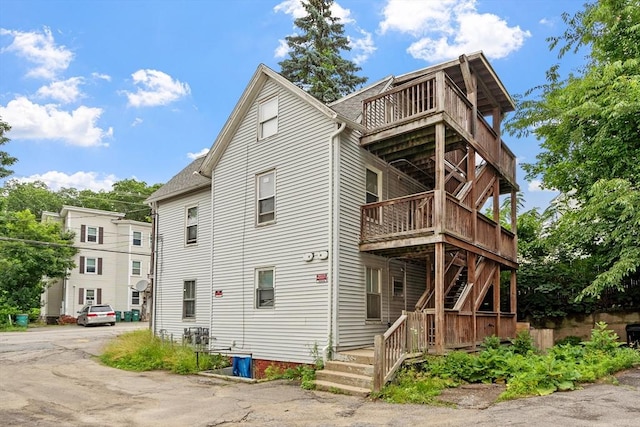 376 Elm St, Fitchburg, MA 01420 - view of front of property featuring stairway and a deck