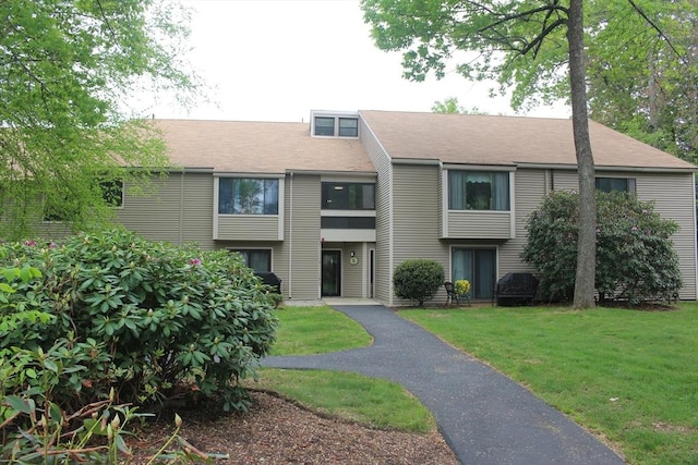 5 Thayer Pond Dr Unit 8, Oxford, MA 01537 - view of property with a front yard and roof with shingles
