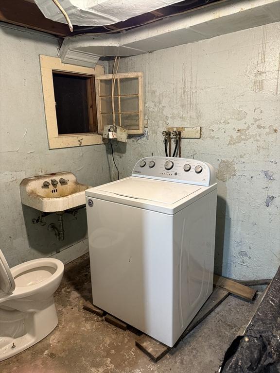 laundry room with washer / clothes dryer and sink