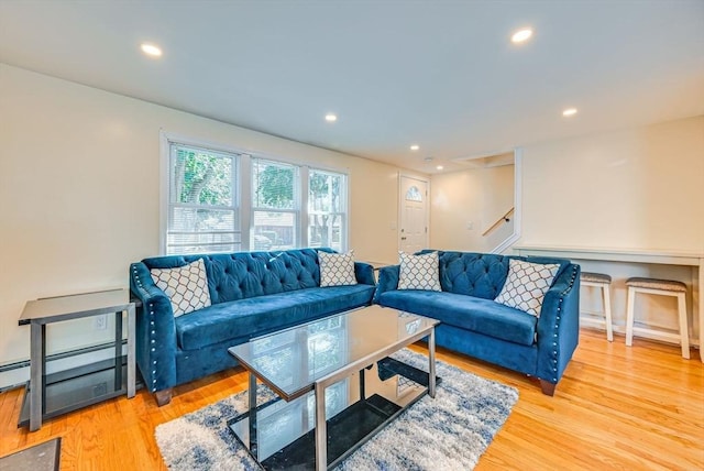 44 Georgetown St, Springfield, MA 01104 - living room with wood finished floors, recessed lighting, stairway, and baseboard heating