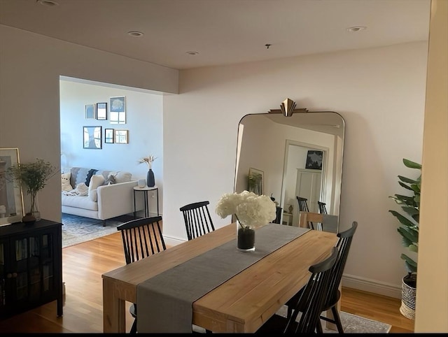 4 Charlesgate E Unit 604, Boston, MA 02215 - dining room with light wood finished floors