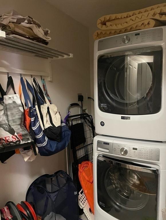 4 Charlesgate E Unit 604, Boston, MA 02215 - laundry area with stacked washer and clothes dryer