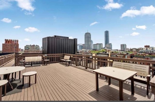 4 Charlesgate E Unit 604, Boston, MA 02215 - wooden terrace featuring a skyline view