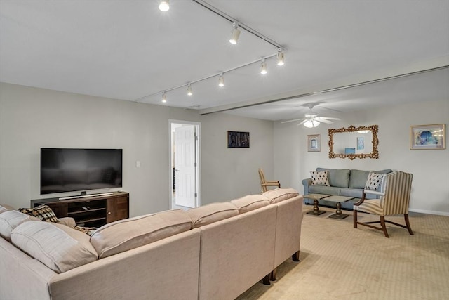 living room featuring light colored carpet and ceiling fan