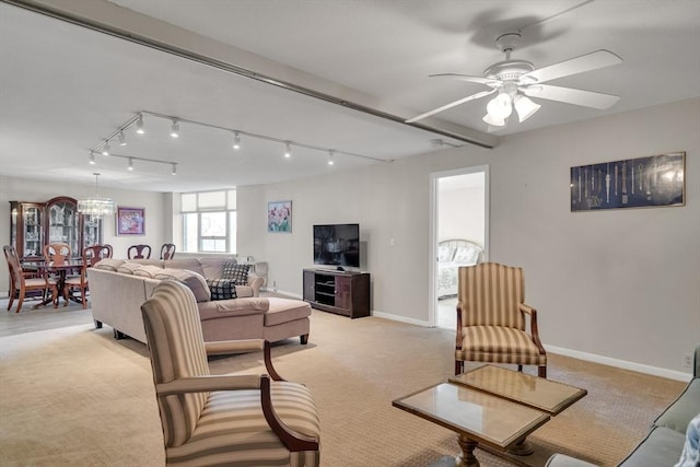 carpeted living room with ceiling fan