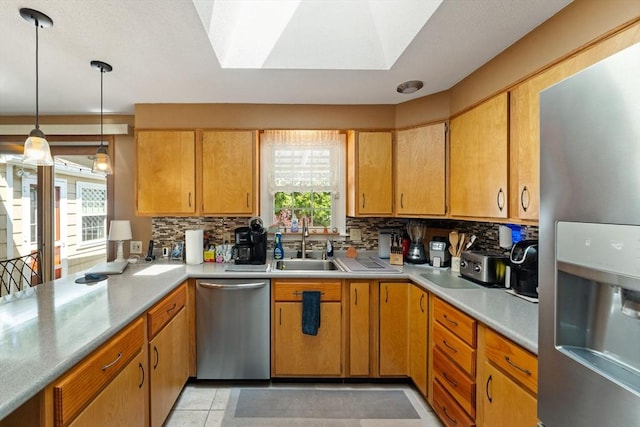 1 Redgate Ln, Holden, MA 01520 - kitchen with stainless steel appliances, tasteful backsplash, light countertops, and a peninsula