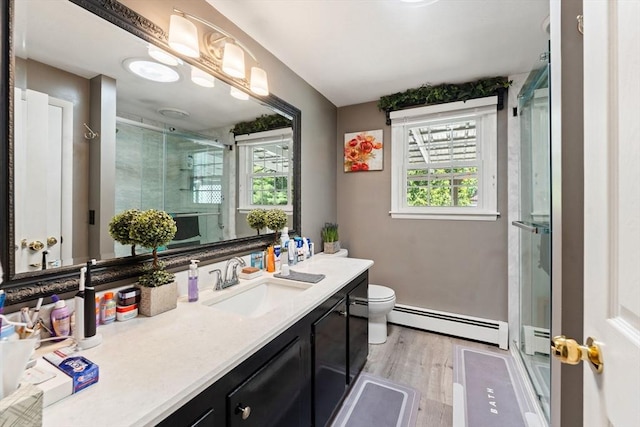 1 Redgate Ln, Holden, MA 01520 - bathroom featuring baseboard heating, plenty of natural light, vanity, and a shower stall