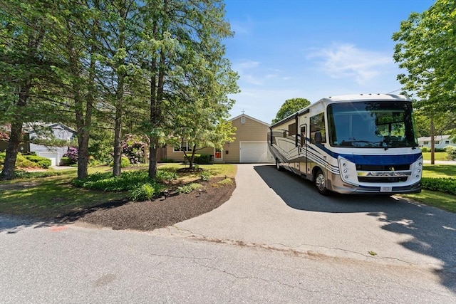 1 Redgate Ln, Holden, MA 01520 - view of front of home with asphalt driveway and a garage