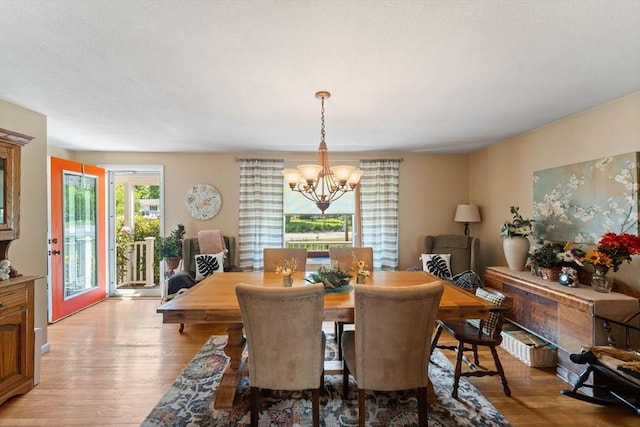 1 Redgate Ln, Holden, MA 01520 - dining area featuring a chandelier and light wood-style floors