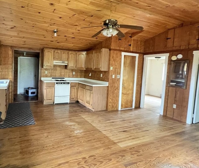 11 Summit Ave, Lakeville, MA 02347 - kitchen with white range, wood ceiling, vaulted ceiling, under cabinet range hood, and wood finished floors