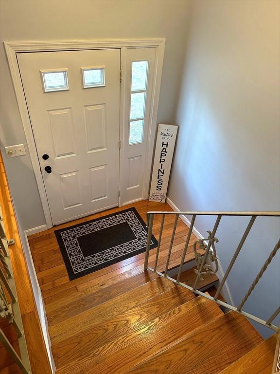 entrance foyer with hardwood / wood-style flooring