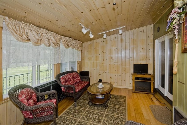 90 Westwood Ave, East Longmeadow, MA 01028 - sitting room featuring rail lighting, wood finished floors, wooden walls, and wooden ceiling