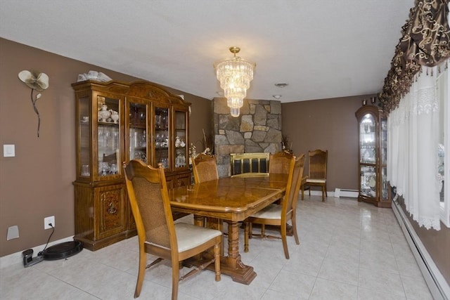 90 Westwood Ave, East Longmeadow, MA 01028 - dining room with light tile patterned floors, baseboards, an inviting chandelier, and baseboard heating