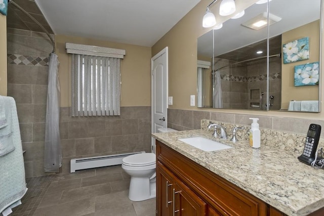 90 Westwood Ave, East Longmeadow, MA 01028 - full bathroom with vanity, a baseboard radiator, a stall shower, and tile walls