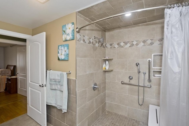 90 Westwood Ave, East Longmeadow, MA 01028 - bathroom featuring wood finished floors and a tile shower