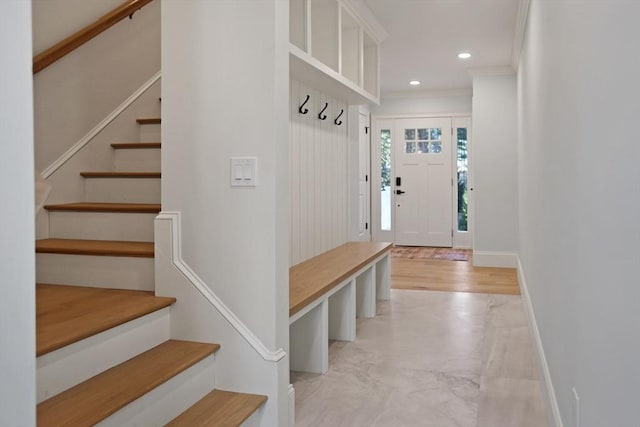 mudroom with ornamental molding