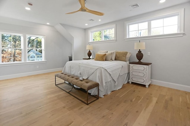 bedroom featuring ceiling fan and light hardwood / wood-style flooring