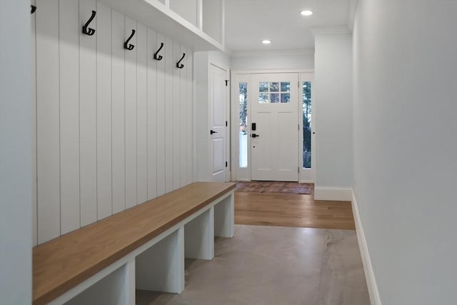 mudroom featuring ornamental molding