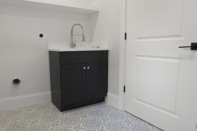 bathroom featuring tile patterned floors and vanity