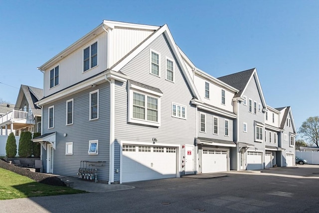 27 Mill St Unit B, Quincy, MA 02169 - view of side of property with a garage and a residential view