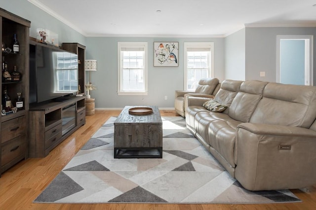 27 Mill St Unit B, Quincy, MA 02169 - living room with ornamental molding, light wood finished floors, and baseboards