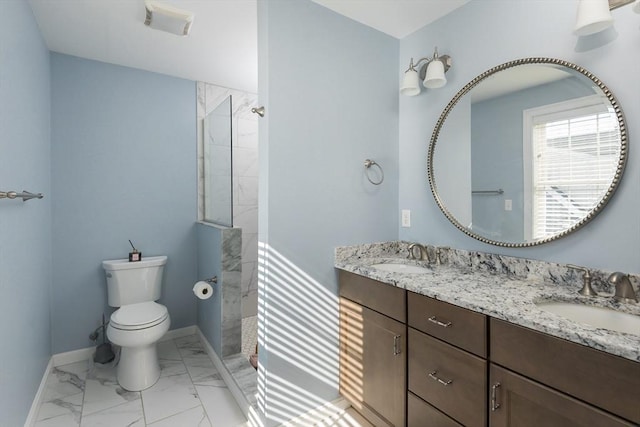 27 Mill St Unit B, Quincy, MA 02169 - full bath featuring double vanity, a walk in shower, toilet, baseboards, and marble finish flooring