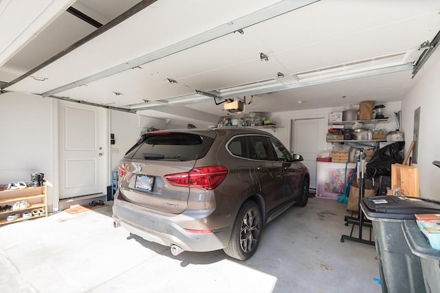 27 Mill St Unit B, Quincy, MA 02169 - garage featuring a garage door opener