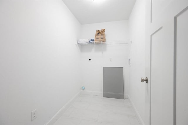 18 Tispaquin St, Middleboro, MA 02346 - washroom featuring hookup for an electric dryer, light marble finish flooring, and baseboards