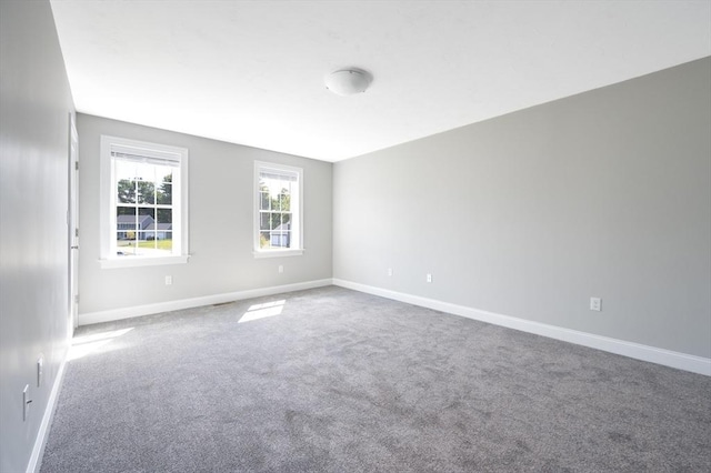 18 Tispaquin St, Middleboro, MA 02346 - empty room with carpet and baseboards