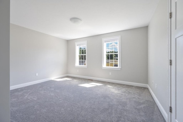 18 Tispaquin St, Middleboro, MA 02346 - unfurnished room featuring carpet floors and baseboards
