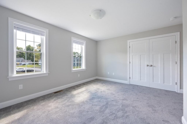 18 Tispaquin St, Middleboro, MA 02346 - unfurnished bedroom featuring carpet floors, baseboards, and a closet