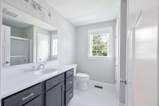 18 Tispaquin St, Middleboro, MA 02346 - bathroom with a stall shower, vanity, toilet, and baseboards