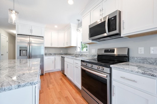18 Tispaquin St, Middleboro, MA 02346 - kitchen featuring stainless steel appliances, a sink, light wood-style floors, white cabinetry, and recessed lighting