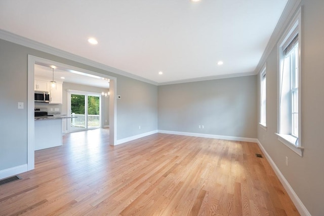 18 Tispaquin St, Middleboro, MA 02346 - unfurnished room featuring ornamental molding, baseboards, light wood finished floors, and recessed lighting